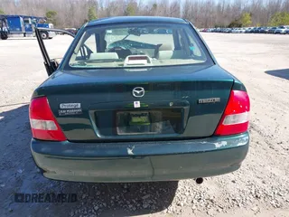 2001 Mazda Protege LX with VIN JM1BJ225310404647, listed as a IAAI auction lot 41480466 with 115,606 mi miles and . Bid and sale history available at carsss.com. Image 16.