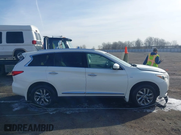 2015 Infiniti QX60 with VIN 5N1AL0MM0FC515589, listed as a IAAI auction lot 41420447 with 172,570 mi miles and . Bid and sale history available at DreamBid. Image 13.