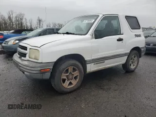 2002 Chevrolet Tracker z VIN 2CNBE18CX26926779, wystawiony jako Copart lot #86788864 z przebiegiem 172 966 mil mil oraz Szkoda całkowita • Salvage title. Historia ofert i sprzedaży dostępna na DreamBid. Obrazek 1.