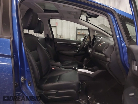2018 Honda Fit EX-L with VIN 3HGGK5H9XJM703209, listed as a IAAI auction lot 41877277 with 101,062 mi miles. Bid and sale history available at carsss.com. Image 5.
