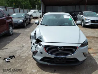 2017 Mazda CX-3 Grand Touring with VIN JM1DKFD78H0160564, listed as a IAAI auction lot 39236942 with 50,921 mi miles. Bid and sale history available at carsss.com. Image 12.