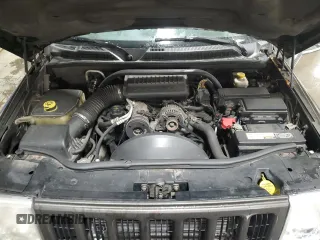 2006 Jeep Commander z VIN 1J8HG48K86C296039, wystawiony jako Copart lot #84716894 z przebiegiem 181 297 mil mil oraz Szkoda całkowita • Salvage title. Historia ofert i sprzedaży dostępna na DreamBid. Obrazek 11.