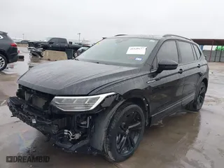 2023 Volkswagen Tiguan SE R-Line Black with VIN 3VVCB7AX0PM061742, listed as a IAAI auction lot 41528630 with 22,571 mi miles. Bid and sale history available at carsss.com. Image 19.