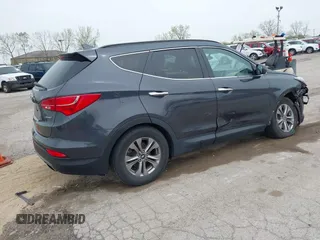 2016 Hyundai Santa Fe z VIN 5XYZU3LB0GG318165, wystawiony jako IAAI lot #42158474 z przebiegiem 74 420 mil mil oraz . Historia ofert i sprzedaży dostępna na DreamBid. Obrazek 4.