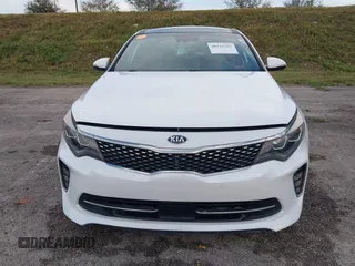 2018 Kia Optima SX z VIN 5XXGV4L21JG182103, wystawiony jako IAAI lot #40522762 z przebiegiem 60 542 mil mil oraz . Historia ofert i sprzedaży dostępna na DreamBid. Obrazek 12.