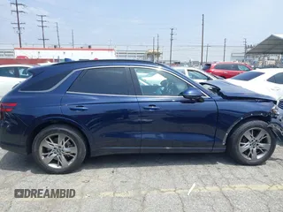 2022 Genesis GV70 Sport z VIN KMUMCDTC8NU073409, wystawiony jako IAAI lot #42165056 z przebiegiem 78 392 mil mil oraz . Historia ofert i sprzedaży dostępna na DreamBid. Obrazek 14.