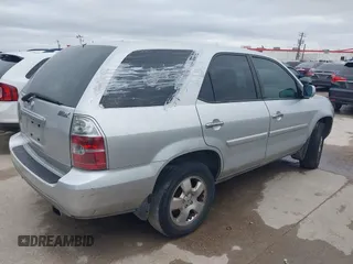 2005 Acura MDX with VIN 2HNYD18245H557011, listed as a IAAI auction lot 41572677 with 275,411 mi miles. Bid and sale history available at carsss.com. Image 4.
