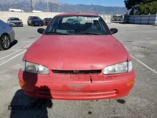 1995 Geo Prizm z VIN 1Y1SK5266SZ058383, wystawiony jako Copart lot #86238674 z przebiegiem 86 707 mil mil oraz Szkody całkowita. Historia ofert i sprzedaży dostępna na DreamBid. Obrazek 5.