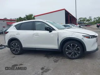 2023 Mazda CX-5 2.5 S Premium Package with VIN JM3KFBDM1P0126787, listed as a IAAI auction lot 41164586 with 12,076 mi miles. Bid and sale history available at carsss.com. Image 13.