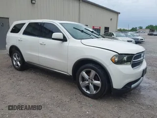2012 Dodge Durango SXT with VIN 1C4RDHAG0CC121748, listed as a IAAI auction lot 42122731 with 220,611 mi miles. Bid and sale history available at carsss.com. Image 1.