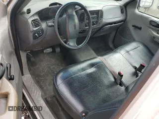1999 Ford F-150 z VIN 1FTRF17W0XNB79739, wystawiony jako Copart lot #87840925 z przebiegiem Nie podano mil oraz Szkoda całkowita • Salvage title. Historia ofert i sprzedaży dostępna na DreamBid. Obrazek 8.