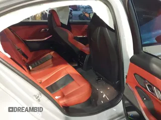 2023 BMW M3 Competition xDrive with VIN WBS43AY03PFP13218, listed as a IAAI auction lot 40936588 with 26,610 mi miles and . Bid and sale history available at DreamBid. Image 8.