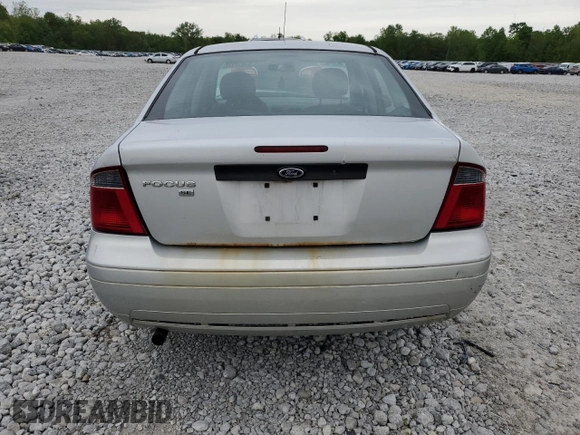 2007 Ford Focus S z VIN 1FAFP34N37W293421, wystawiony jako Copart lot #57833445 z przebiegiem 159 523 mil mil oraz Szkoda całkowita • Salvage title. Historia ofert i sprzedaży dostępna na DreamBid. Obrazek 6.