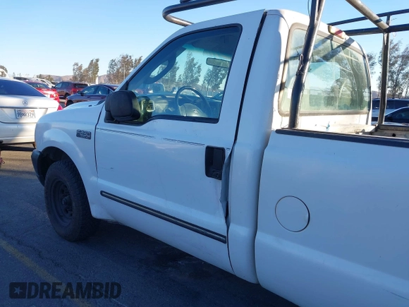2004 Ford Super Duty F-250 XL with VIN 1FTNF20L54EC99861, listed as a IAAI auction lot 41301229 with 320,407 mi miles. Bid and sale history available at carsss.com. Image 16.