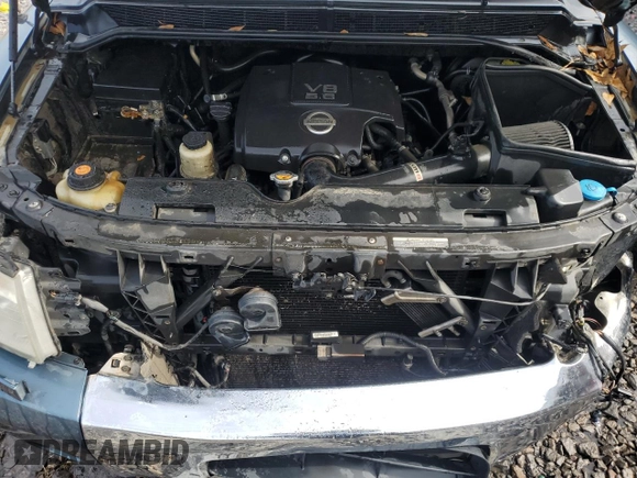 2011 Nissan Titan Pro-4X with VIN 1N6BA0ECXBN302004, listed as a Copart auction lot 89343945 with 427,682 mi miles and Salvage title. Bid and sale history available at DreamBid. Image 11.