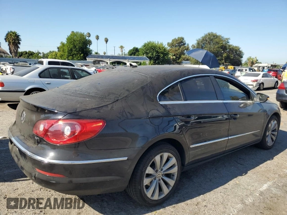 2010 Volkswagen CC Sport with VIN WVWML7AN0AE517475, listed as a Copart auction lot 67077014 with 147,478 mi miles and Salvage Title. Bid and sale history available at carsss.com. Image 3.