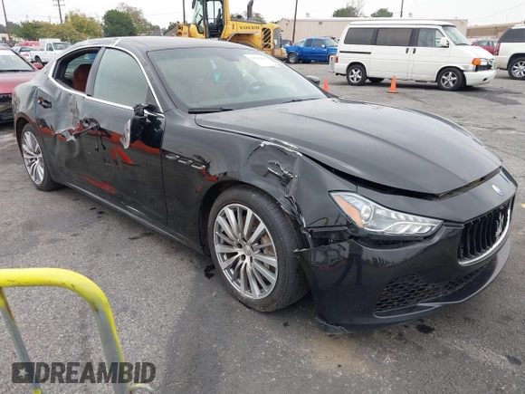 2015 Maserati Ghibli z VIN ZAM57XSA4F1151843, wystawiony jako IAAI lot #38392898 z przebiegiem 88 147 mil mil oraz . Historia ofert i sprzedaży dostępna na DreamBid. Obrazek 1.