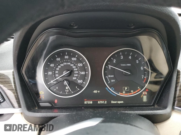 2017 BMW X1 sDrive28i with VIN WBXHU7C33H5H34013, listed as a Copart auction lot 38409444 with 87,558 mi miles and Salvage Title. Bid and sale history available at carsss.com. Image 9.