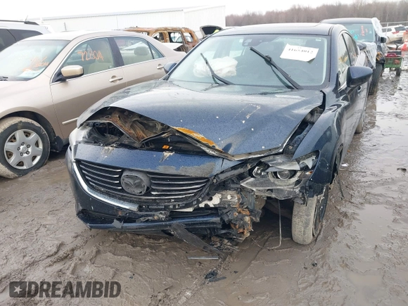 2016 Mazda Mazda6 i Touring with VIN JM1GJ1T54G1434497, listed as a IAAI auction lot 41654012 with 133,901 mi miles. Bid and sale history available at carsss.com. Image 6.