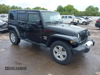 2008 Jeep Wrangler Unlimited Sahara z VIN 1J4GA59128L512626, wystawiony jako IAAI lot #42314761 z przebiegiem 116 161 mil mil oraz . Historia ofert i sprzedaży dostępna na DreamBid. Obrazek 1.