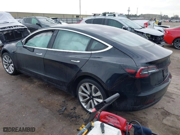 2018 Tesla Model 3 Long Range Battery with VIN 5YJ3E1EA6JF176236, listed as a IAAI auction lot 41470753 with 181,827 mi miles. Bid and sale history available at carsss.com. Image 3.