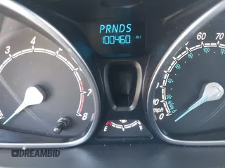 2019 Ford Fiesta SE z VIN 3FADP4BJ2KM131012, wystawiony jako IAAI lot #42228822 z przebiegiem 100 460 mil mil oraz . Historia ofert i sprzedaży dostępna na DreamBid. Obrazek 7.