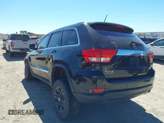 2013 Jeep Grand Cherokee Laredo with VIN 1C4RJFAG2DC643926, listed as a IAAI auction lot 41723575 with 125,048 mi miles. Bid and sale history available at carsss.com. Image 3.