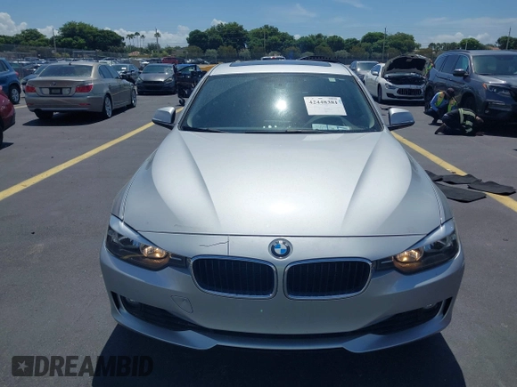 2013 BMW 3 Series 328i with VIN WBA3C1G50DNN93277, listed as a IAAI auction lot 42448381 with 83,758 mi miles and . Bid and sale history available at DreamBid. Image 6.
