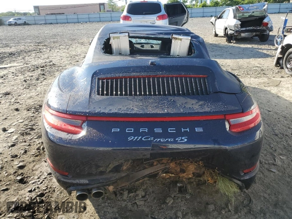 2018 Porsche 911 Carrera S with VIN WP0CB2A98JS147463, listed as a Copart auction lot 57485085 with Not provided miles and Salvage title. Bid and sale history available at DreamBid. Image 6.