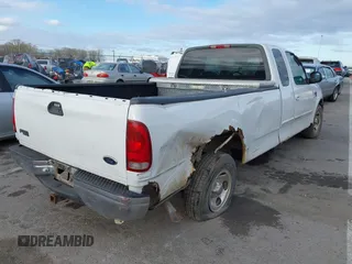 2000 Ford F-150 XL with VIN 1FTRX17W2YNA88695, listed as a IAAI auction lot 41840790 with 1 mi miles. Bid and sale history available at carsss.com. Image 4.