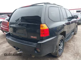 2008 GMC Envoy Denali with VIN 1GKES63M182191403, listed as a IAAI auction lot 41499601 with 217,071 mi miles. Bid and sale history available at carsss.com. Image 4.