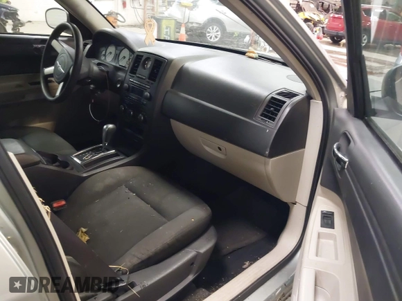 2005 Chrysler 300 with VIN 2C3JA43R55H569369, listed as a IAAI auction lot 41132751 with 123,253 mi miles. Bid and sale history available at carsss.com. Image 5.