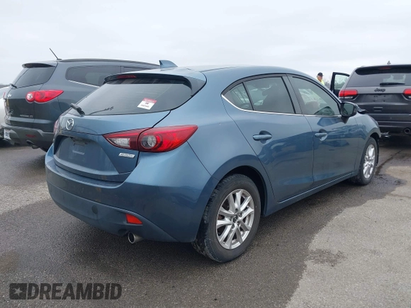 2015 Mazda 3 i Grand Touring with VIN 3MZBM1M75FM225026, listed as a IAAI auction lot 41510336 with Not provided miles and . Bid and sale history available at DreamBid. Image 4.