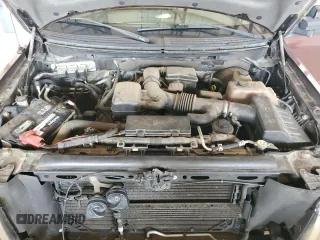 2010 Ford F-150 XL with VIN 1FTFX1CV0AFA82944, listed as a Copart auction lot 62912345 with 104,967 mi miles and Salvage title. Bid and sale history available at DreamBid. Image 11.