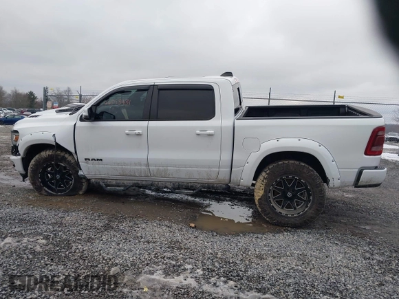 2023 Ram 1500 Laramie with VIN 1C6SRFJT3PN519364, listed as a IAAI auction lot 41553431 with 23,541 mi miles and . Bid and sale history available at DreamBid. Image 14.