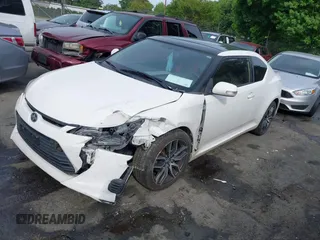 2014 Scion tC z VIN JTKJF5C77E3082073, wystawiony jako IAAI lot #42107615 z przebiegiem 223 895 mil mil oraz . Historia ofert i sprzedaży dostępna na DreamBid. Obrazek 2.