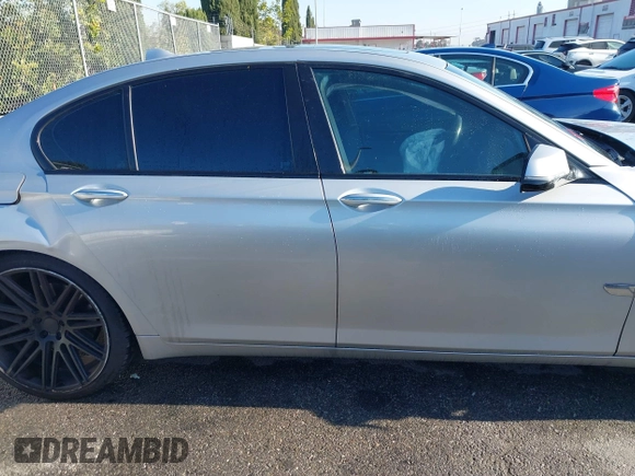 2013 BMW 7 Series 740i with VIN WBAYA6C51DD143836, listed as a IAAI auction lot 39215782 with 176,881 mi miles and . Bid and sale history available at DreamBid. Image 12.