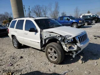 2004 Jeep Grand Cherokee Limited with VIN 1J4GW58N14C358734, listed as a Copart auction lot 52553575 with 156,211 mi miles and Clean Title. Bid and sale history available at carsss.com. Image 4.