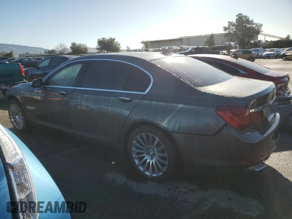2014 BMW 7 Series 740Li with VIN WBAYE4C57ED137758, listed as a Copart auction lot 42347085 with 121,776 mi miles and Salvage Title. Bid and sale history available at carsss.com. Image 2.
