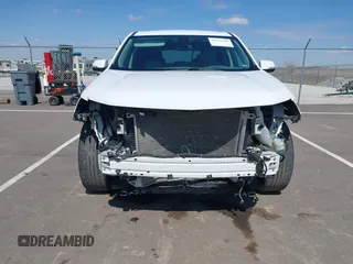 2018 Chevrolet Traverse LT z VIN 1GNEVHKW3JJ125861, wystawiony jako IAAI lot #41876184 z przebiegiem 95 223 mil mil oraz . Historia ofert i sprzedaży dostępna na DreamBid. Obrazek 6.