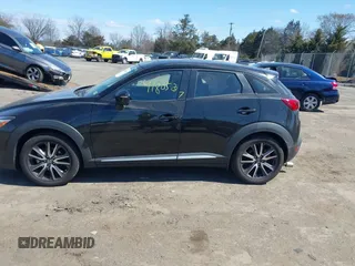 2018 Mazda CX-3 Grand Touring z VIN JM1DKFD75J0312662, wystawiony jako IAAI lot #41805287 z przebiegiem 140 083 mil mil oraz . Historia ofert i sprzedaży dostępna na DreamBid. Obrazek 14.