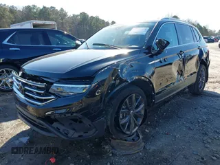2023 Volkswagen Tiguan SE z VIN 3VVMB7AX7PM032629, wystawiony jako IAAI lot #41441468 z przebiegiem 52 518 mil mil oraz . Historia ofert i sprzedaży dostępna na DreamBid. Obrazek 17.