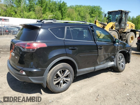 2018 Toyota RAV4 XLE with VIN 2T3WFREVXJW471443, listed as a Copart auction lot 54890655 with 131,677 mi miles and Salvage title. Bid and sale history available at DreamBid. Image 3.