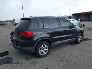 2013 Volkswagen Tiguan SE z VIN WVGAV3AX4DW607441, wystawiony jako IAAI lot #42173141 z przebiegiem 113 186 mil mil oraz . Historia ofert i sprzedaży dostępna na DreamBid. Obrazek 4.