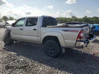 2013 Toyota Tacoma with VIN 3TMLU4EN7DM132916, listed as a Copart auction lot 59885795 with 196,011 mi miles and Salvage title. Bid and sale history available at DreamBid. Image 2.