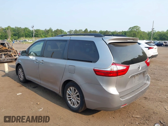 2015 Toyota Sienna XLE with VIN 5TDYK3DC2FS582546, listed as a IAAI auction lot 42443288 with 274,214 mi miles and . Bid and sale history available at DreamBid. Image 3.