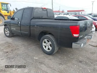 2006 Nissan Titan SE with VIN 1N6BA06A86N570617, listed as a IAAI auction lot 41613217 with 211,095 mi miles and . Bid and sale history available at DreamBid. Image 3.