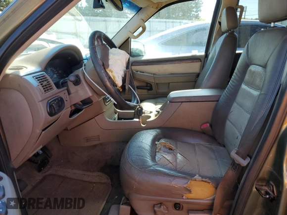 2003 Ford Explorer z VIN 1FMDU84W83ZA36002, wystawiony jako Copart lot #74583784 z przebiegiem 166 977 mil mil oraz Szkoda całkowita • Salvage title. Historia ofert i sprzedaży dostępna na DreamBid. Obrazek 7.