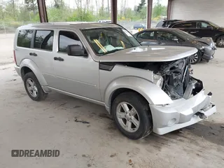 2011 Dodge Nitro SXT z VIN 1D4PU5GK8BW579099, wystawiony jako IAAI lot #42141424 z przebiegiem 92 726 mil mil oraz . Historia ofert i sprzedaży dostępna na DreamBid. Obrazek 1.