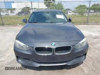 2013 BMW 3 Series 320i with VIN WBA3B1C5XDF462859, listed as a IAAI auction lot 42191369 with 140,253 mi miles and . Bid and sale history available at carsss.com. Image 6.